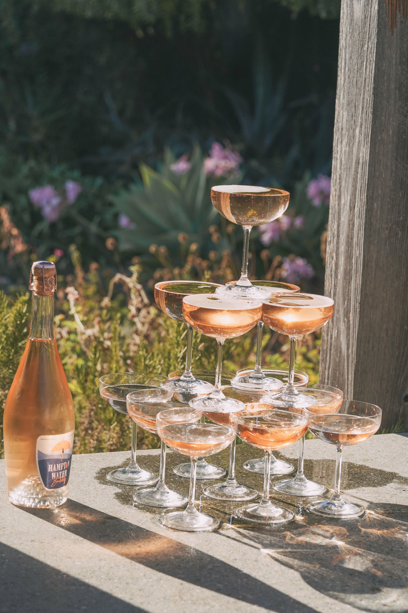 Stacked pyramid of glasses filled with Hampton Water Bubbly